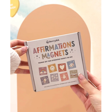 Load image into Gallery viewer, Box of affirmations magnets for kids held by a person with a light background