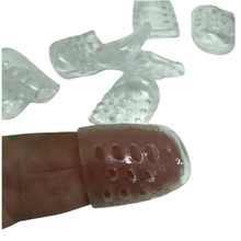 Load image into Gallery viewer, Clear plastic finger splints on a white background