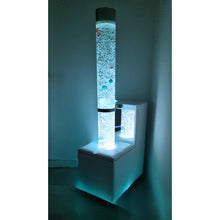 Load image into Gallery viewer, Tall cylindrical light with colorful lights inside on a white base against a plain background