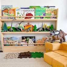 Load image into Gallery viewer, Children's bookshelf withbooks and toys in a room.