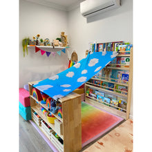 Load image into Gallery viewer, Children's playroom with colorful toys, books, and a blue canopy.