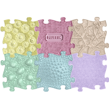 Load image into Gallery viewer, Colorful textured puzzle mats with floral, leaf, and bubble patterns on a white background.
