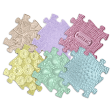 Load image into Gallery viewer, Set of colorful puzzle pieces with a brand logo on a white background
