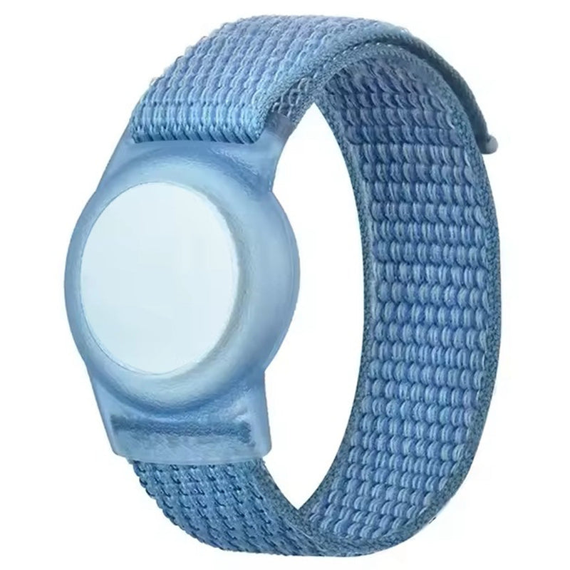 Blue watch with a textured strap on a white background