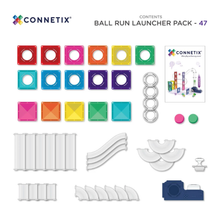 Load image into Gallery viewer, Connetix Ball Run Launcher Pack contents layout on a white background, showing colorful square launcher tiles, white track pieces, metal rings, two round balls, and a small instruction booklet.
