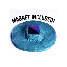 Load image into Gallery viewer, A round textured blue metallic magnetic ring with a square hole in the center, featuring the text 'MAGNET INCLUDED!' above it on a white background.
