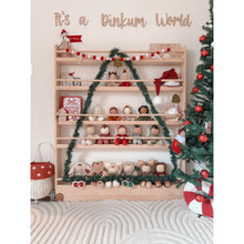Load image into Gallery viewer, Decorative shelf with Christmas-themed items and a tree on a light background
