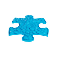 Load image into Gallery viewer, Blue puzzle piece-shaped gel pack on a white background
