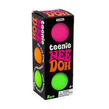 Load image into Gallery viewer, Schyling Teenie Nee Doh 3-pack toy packaging box, featuring three colorful balls visible through circular cutouts on a black box with bold pink, orange, and white lettering.
