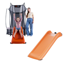 Load image into Gallery viewer, An orange inflatable slide shown alongside a children's trampoline setup with a girl sitting on it and an adult standing behind it, all on a plain white background. The trampoline has a visible VULV logo.

