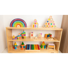 Load image into Gallery viewer, Wooden shelf with colorful children's toys and blocks on a light background
